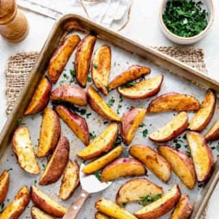 roasted potato wedges on sheet pan