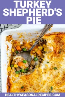 ground turkey shepherd's pie with a spoon scooping some out of the casserole dish