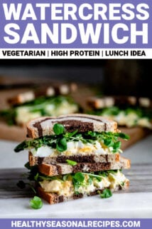 watercress sandwich layered on top of each other with egg salad in it