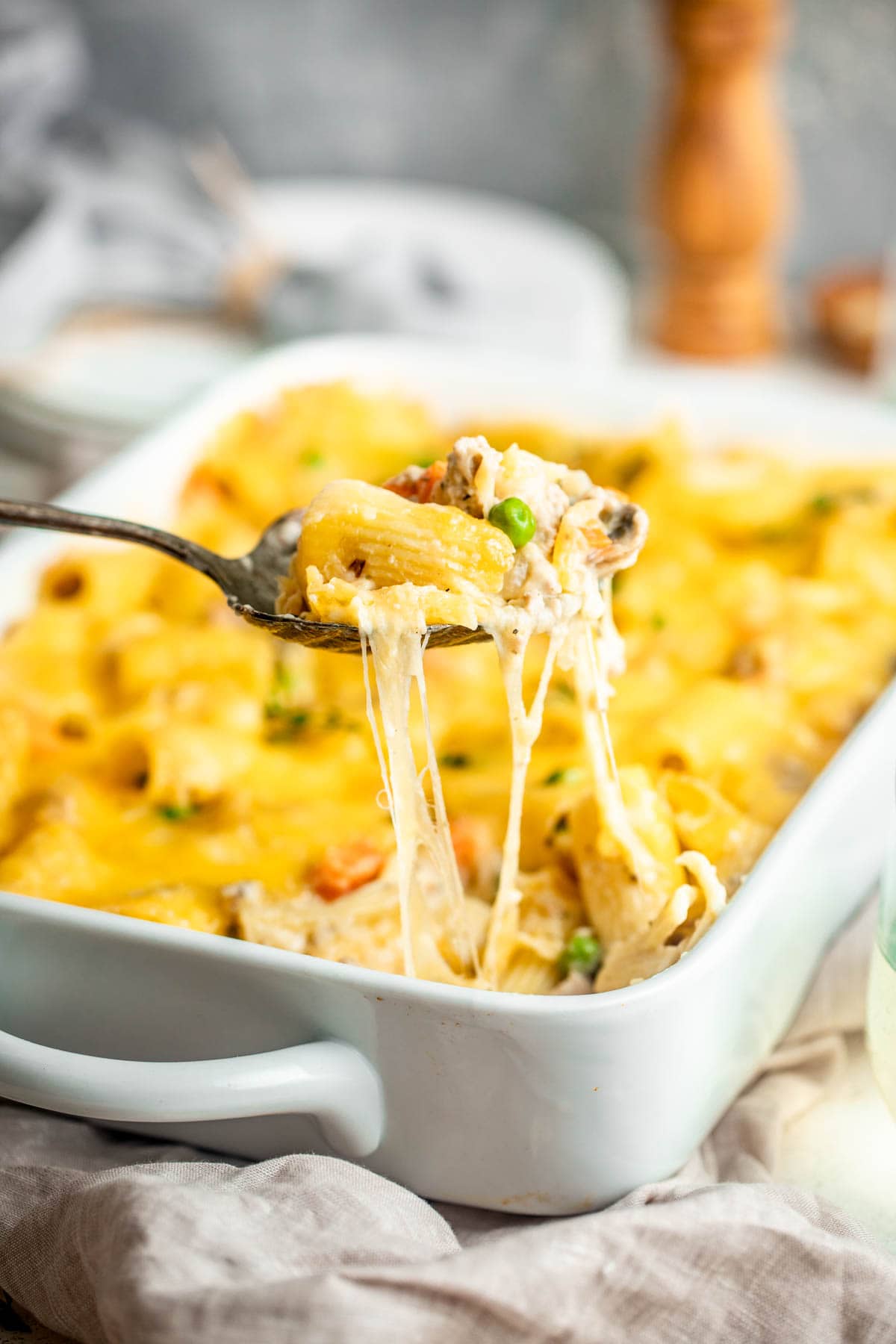 casserole from the side with cheese pull