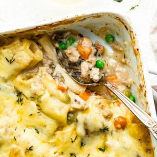 creamy pasta bake with turkey peas and carrots close up