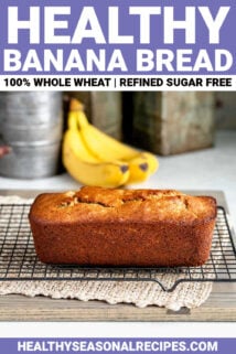 healthy whole wheat banana bread on a wire cooling rack