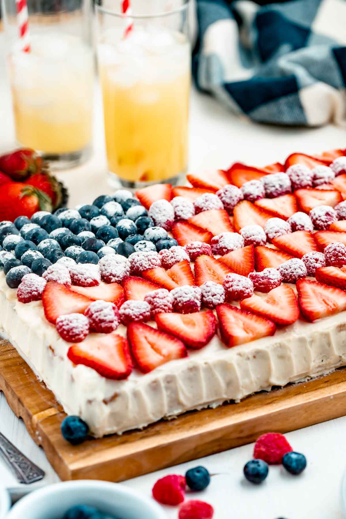 side view of the cake with berries on top