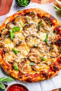 eggplant pizza on cutting board