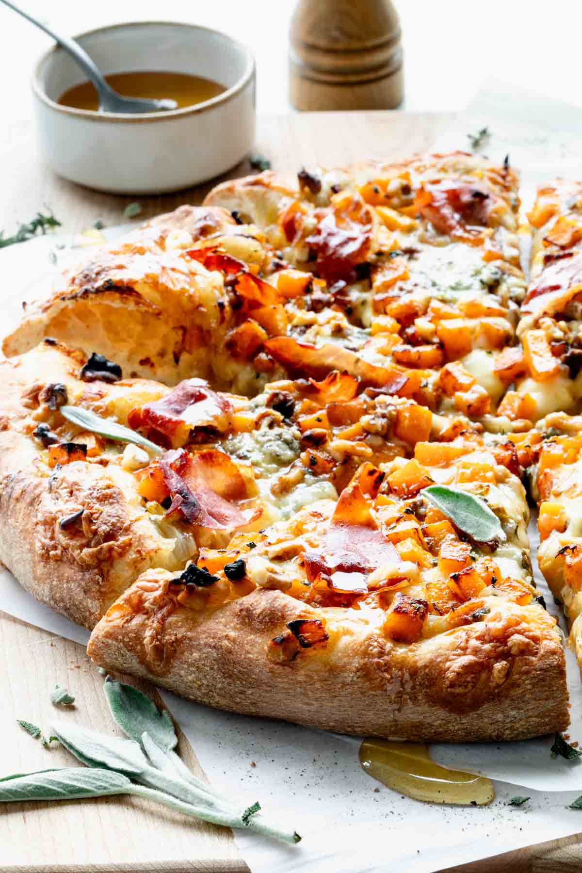 butternut squash pizza on cutting board