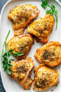 Baked Chicken Thighs on a gray platter