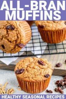 a batch of bran muffins on a cooling rack from the side in a white kitchen with oats on the counter