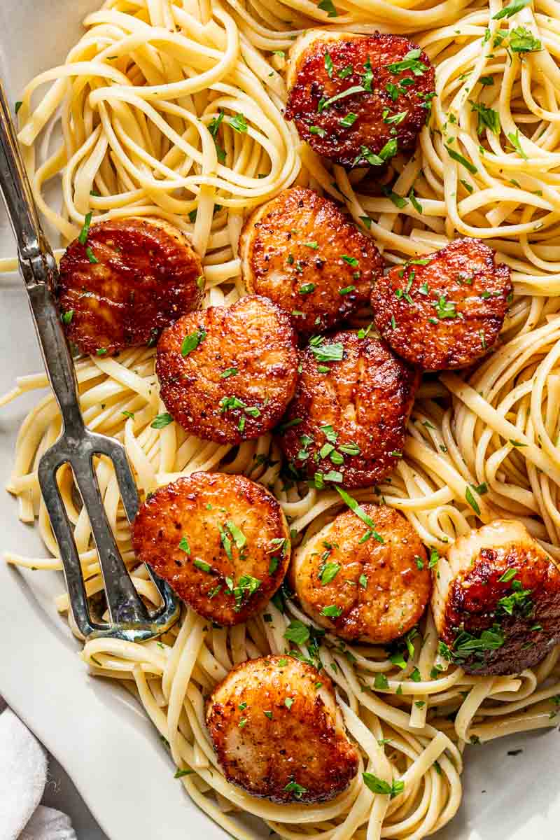 deliciously browned scallops over linguini