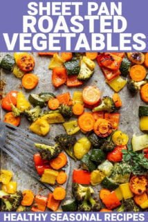 sheet pan roasted vegetables on a baking sheet with a spatula
