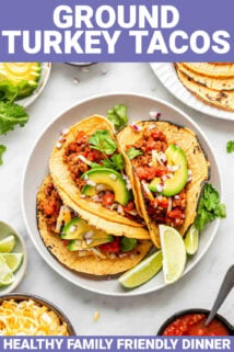 tacos pictured on a plate with ground turkey tacos text overlay