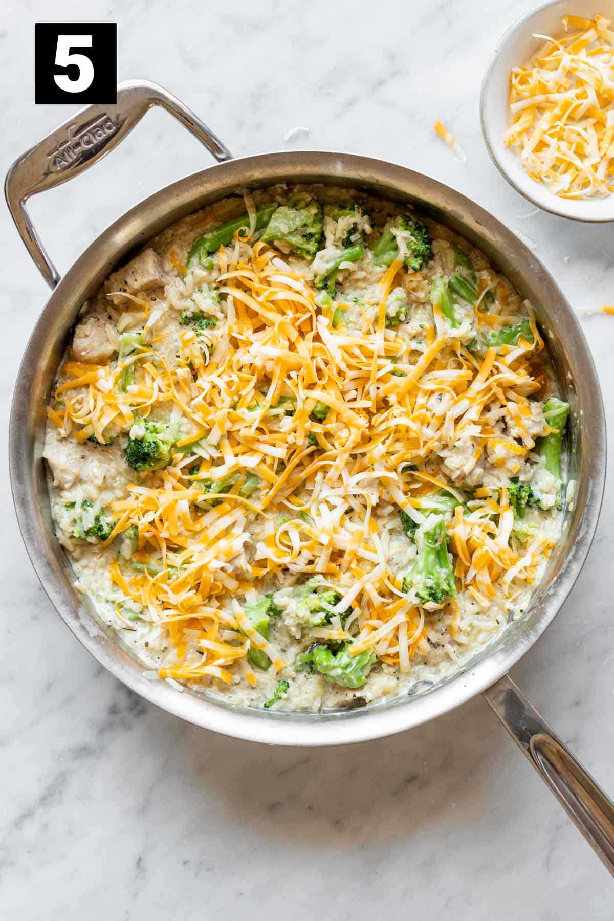 the shredded cheese on top before it is melted