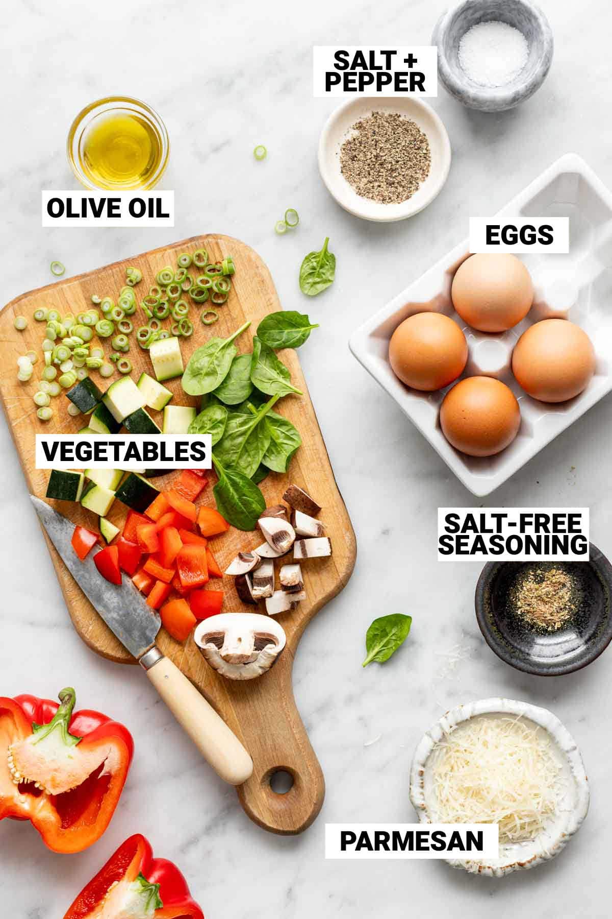 the chopped vegetables, eggs and ingredients for the veggie scrambled eggs recipe