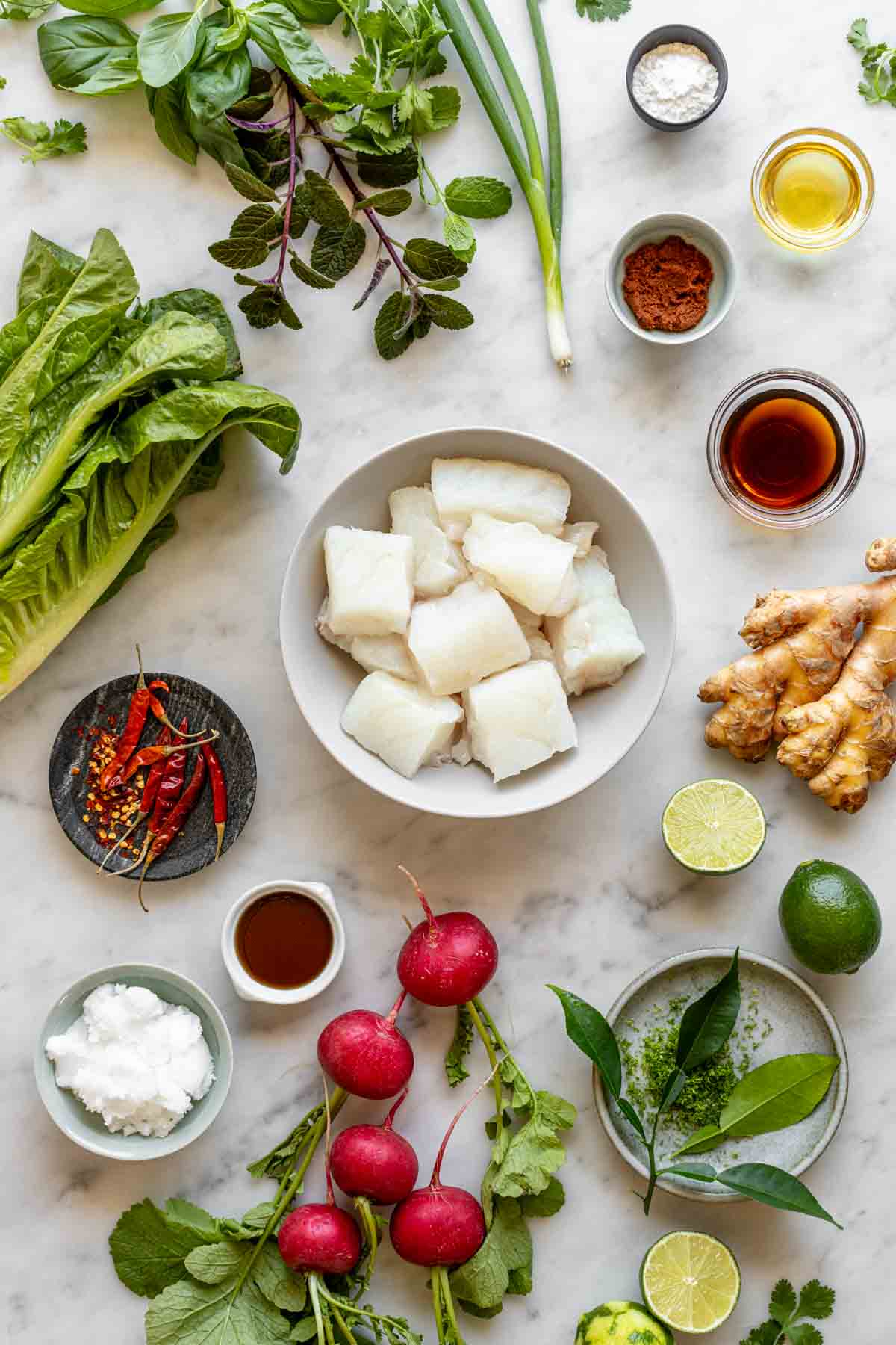 the ingredients for the salad and fish cakes