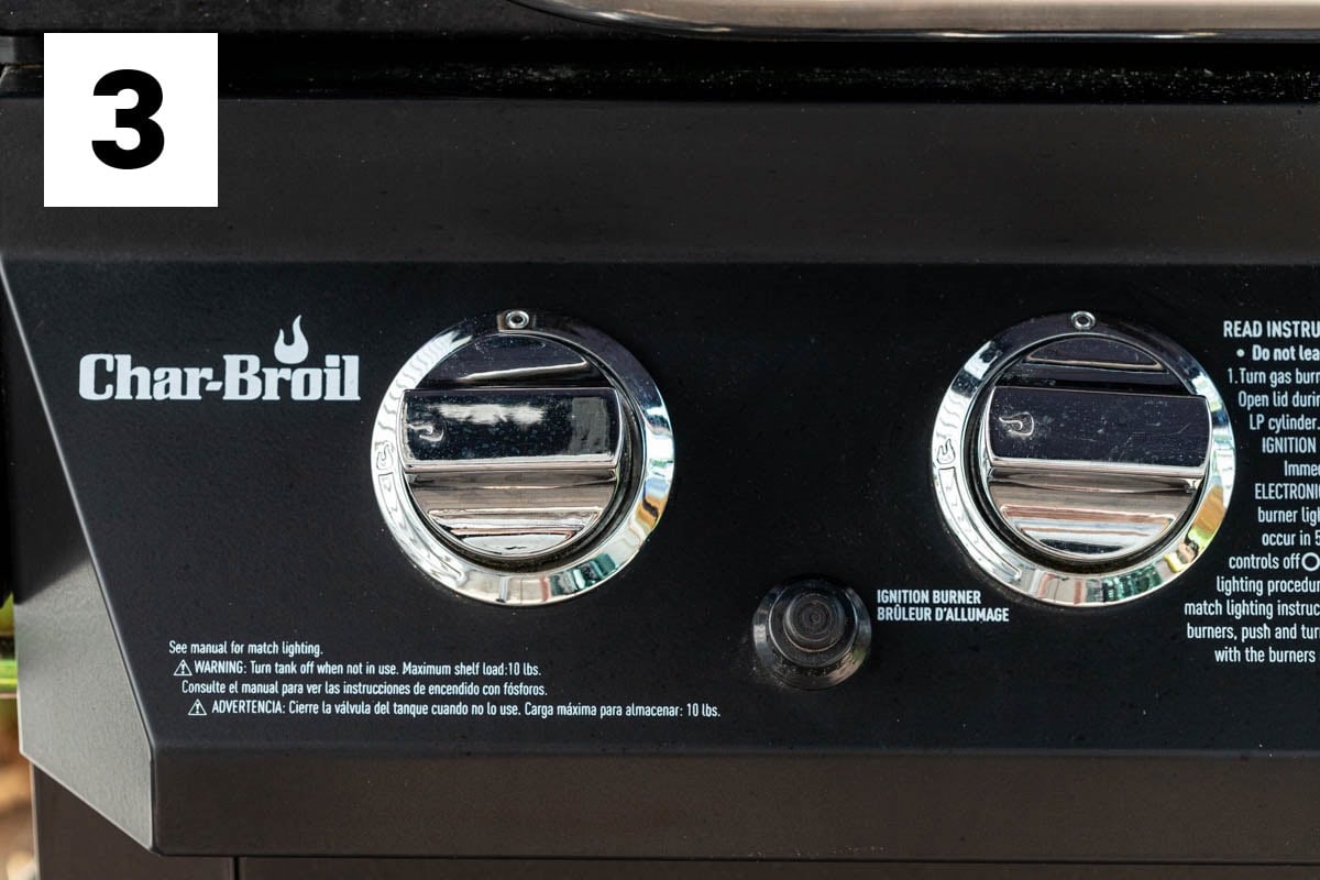 a char-broil grill pictured with two knobs