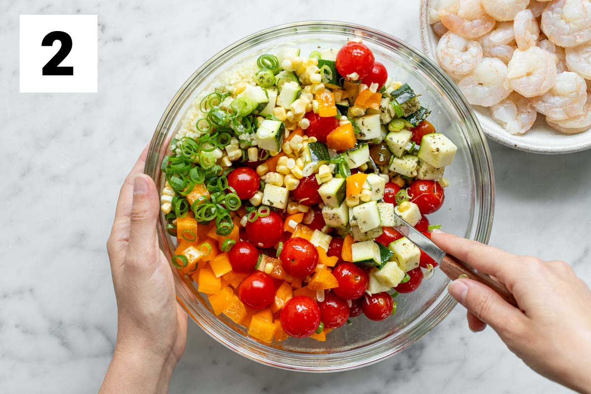 mix the veggies and seasonings with garlic butter