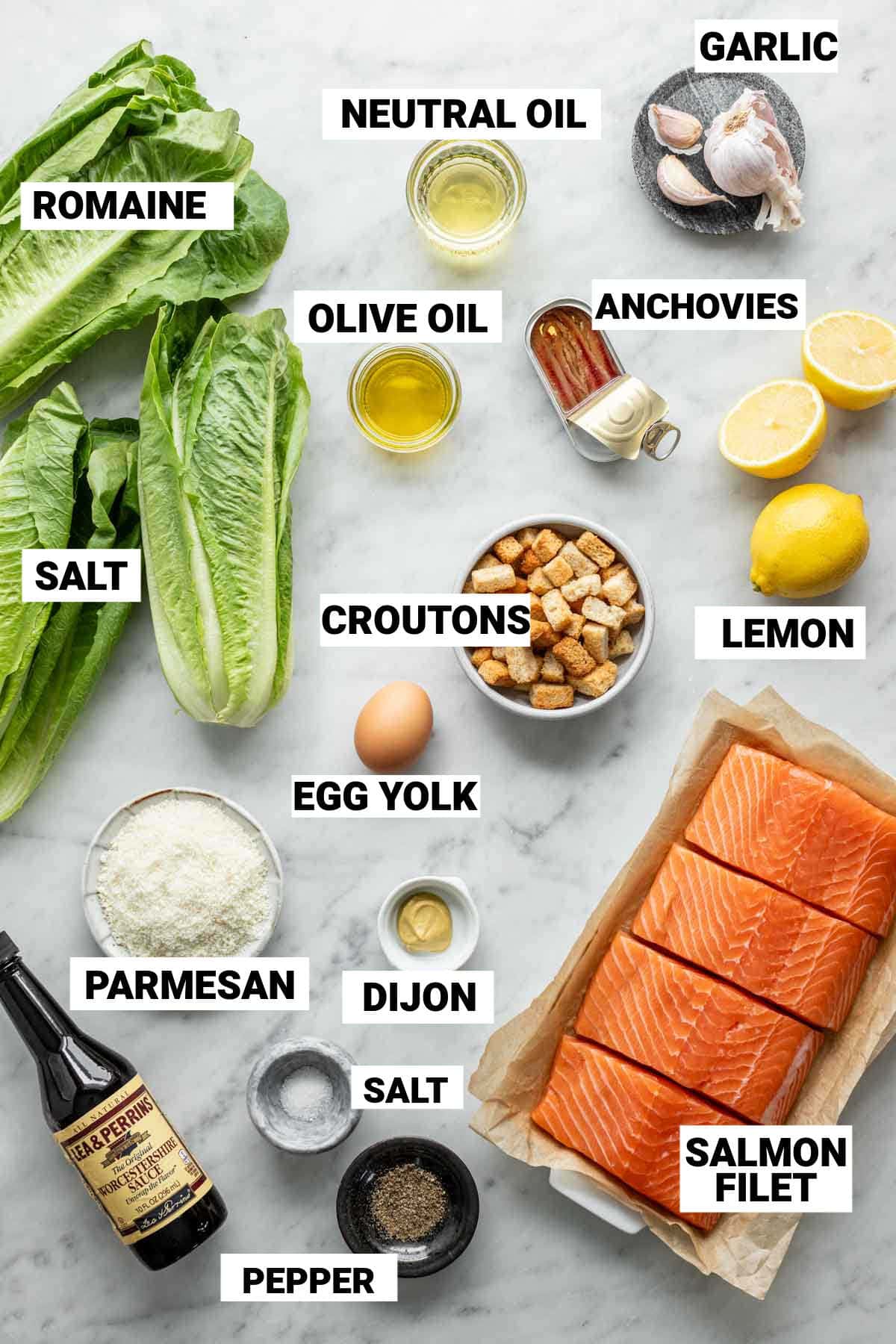 the salmon, lettuce and other ingredients for the caesar salmon