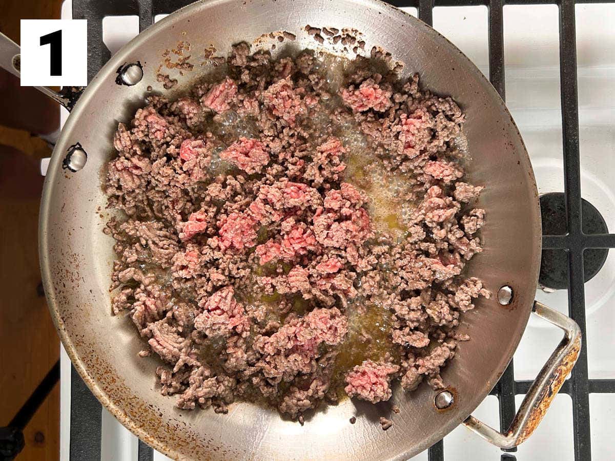 browning the ground beef in the skillet