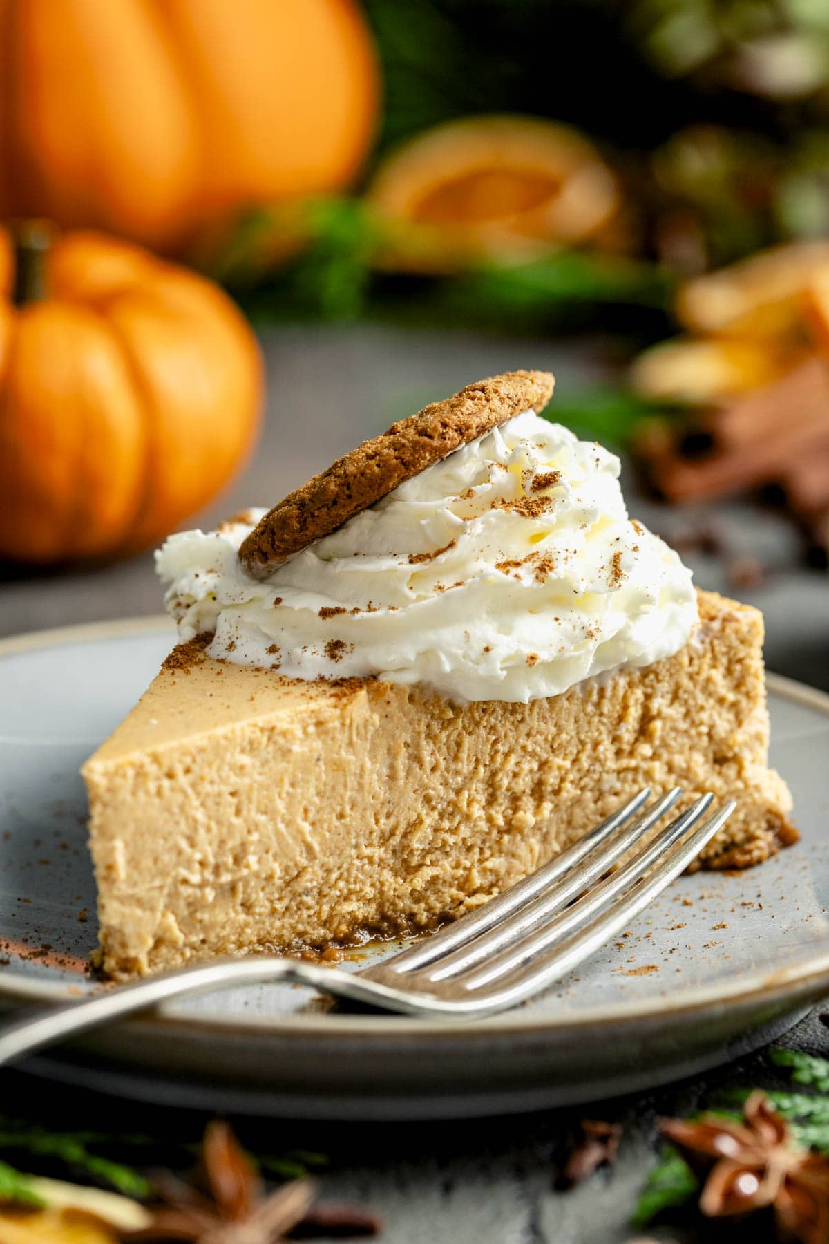 a slice of the cheesecake on a plate with a fork