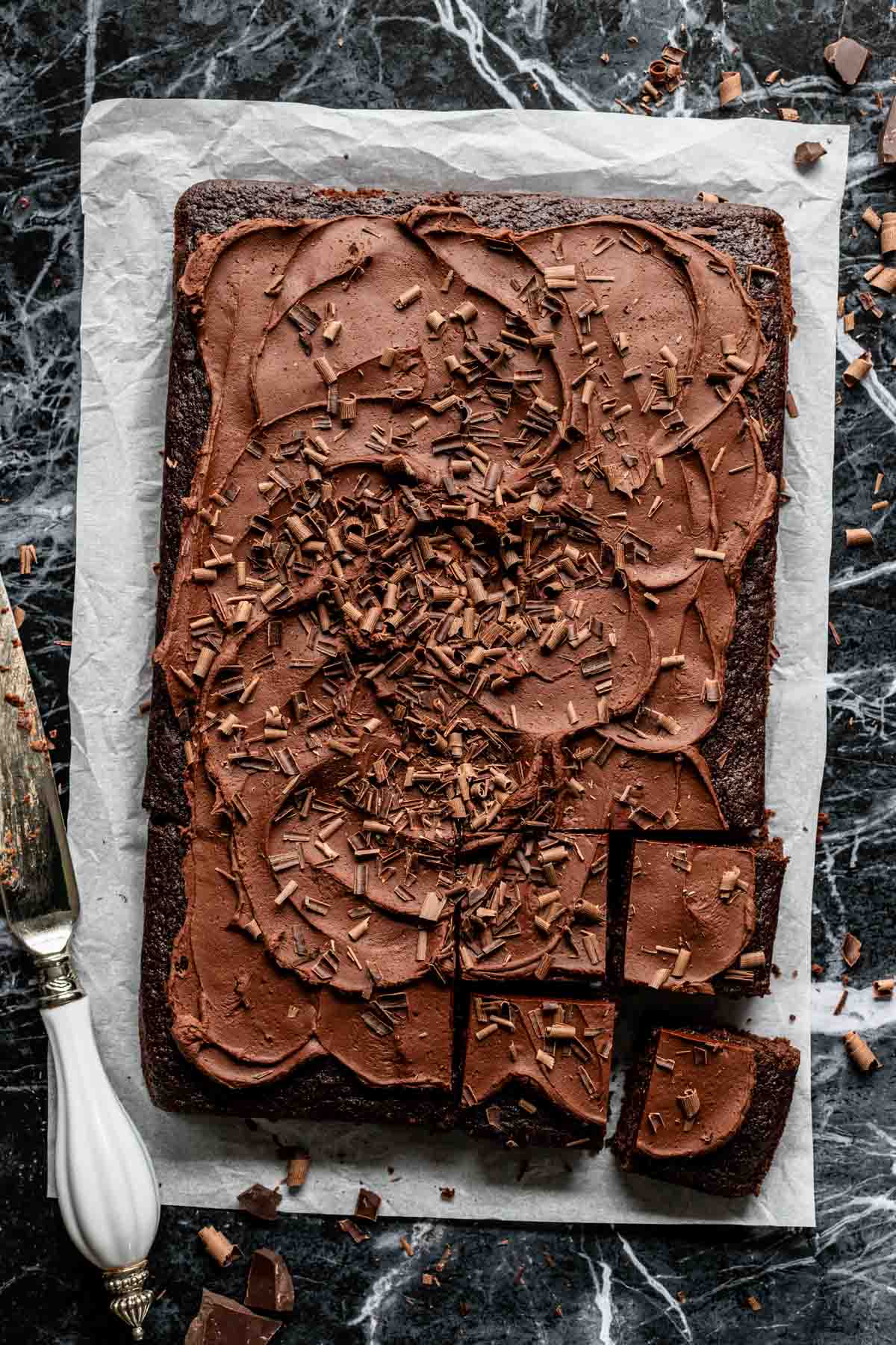 the whole cake from overhead with a few slices cut into it