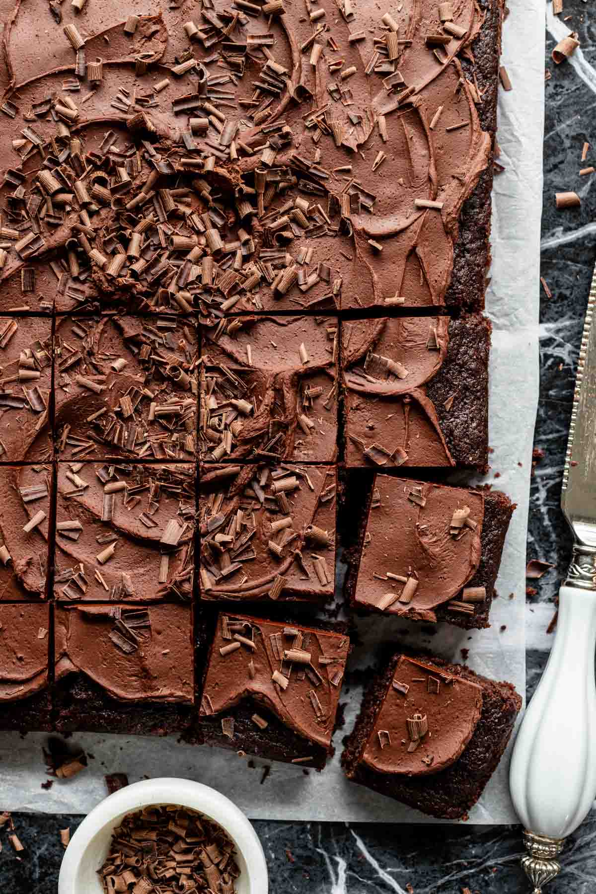 the cake from overhead with chocolate curls on it