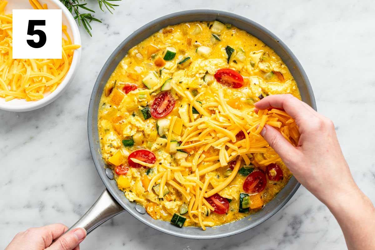 adding cheese on top before baking